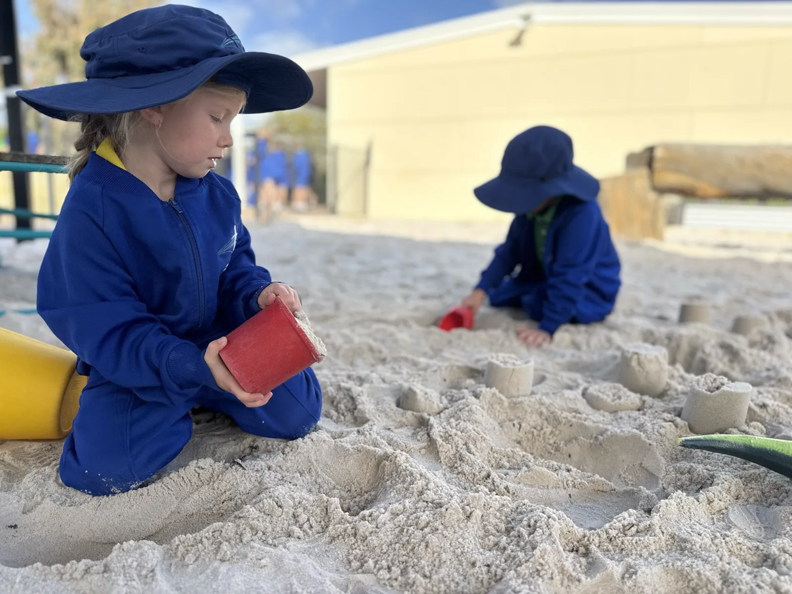 A child engaged in hands-on sensory play at Bunbury Baptist College's Early Learning Centre
