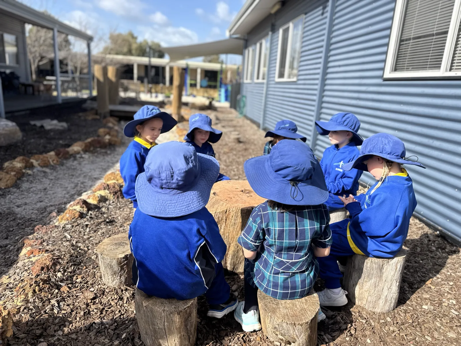 An educator warmly engaging with a child at Bunbury Baptist College's Early Learning Centre